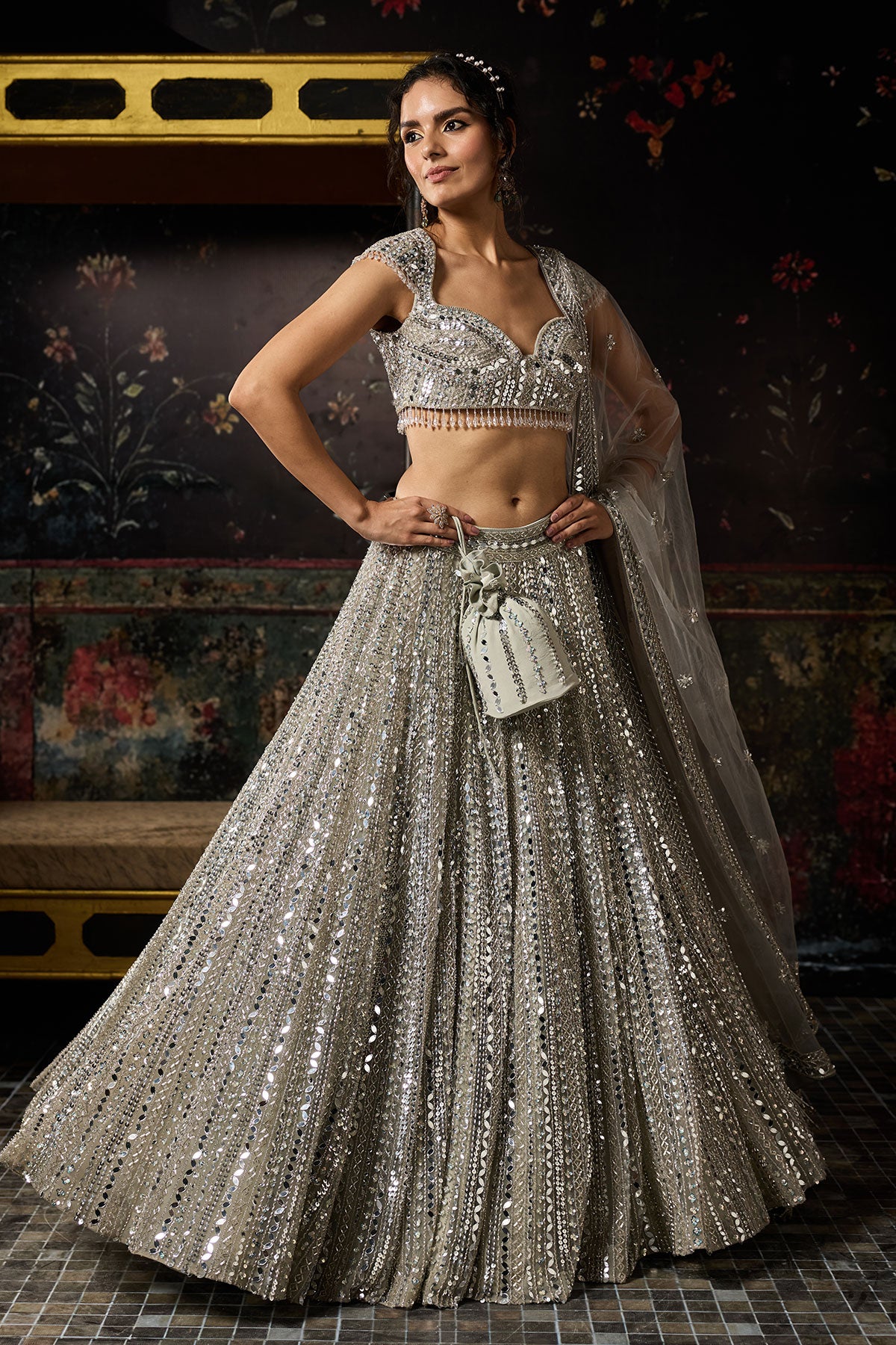 Komal Kapoor in Silver Embellished Mirrorwork Lehenga Set