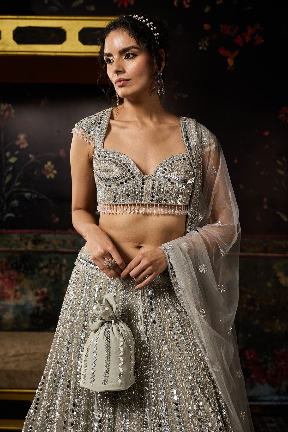 Komal Kapoor in Silver Embellished Mirrorwork Lehenga Set