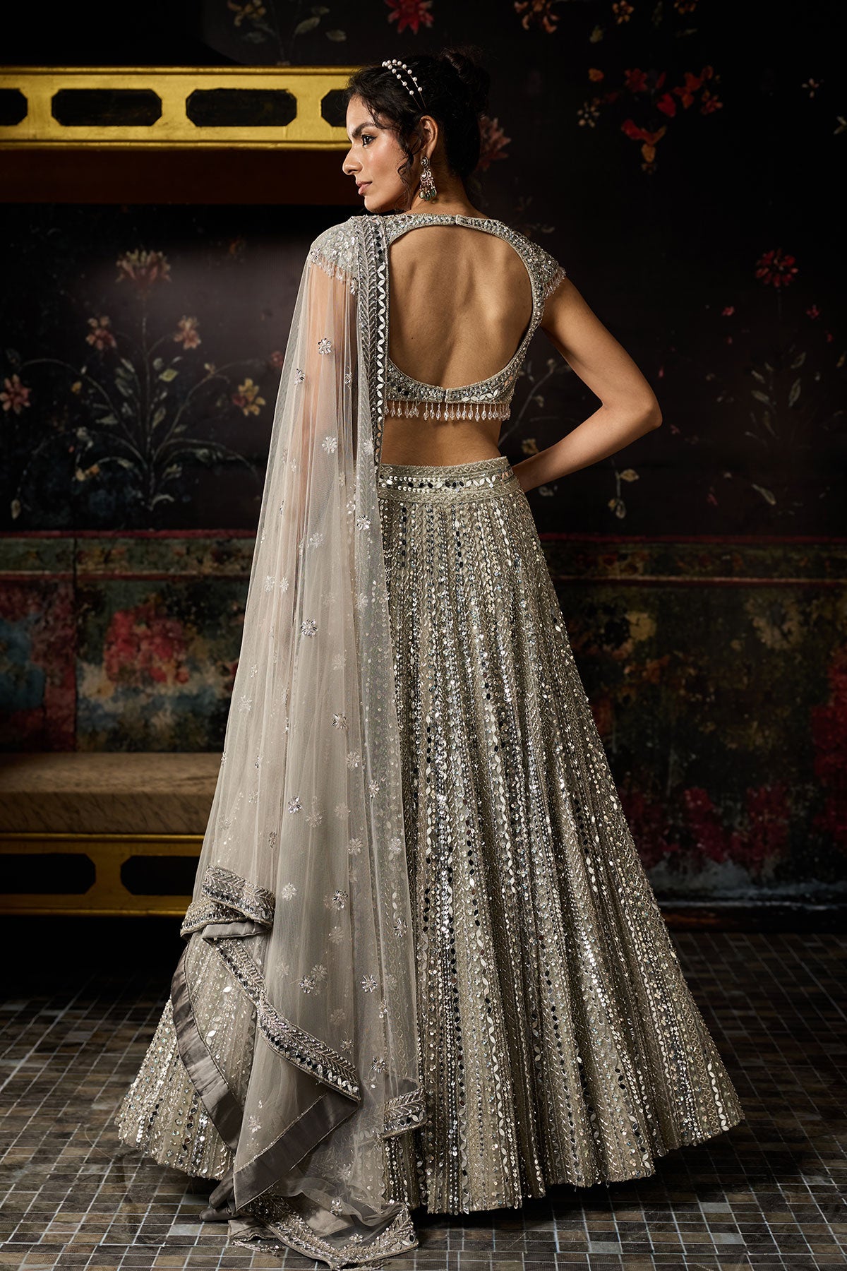 Komal Kapoor in Silver Embellished Mirrorwork Lehenga Set