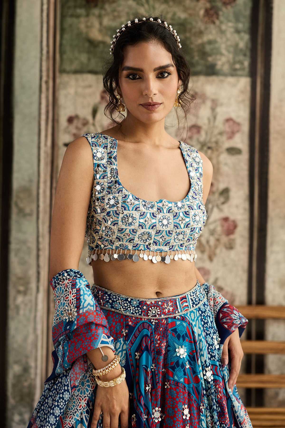 Anjali in Ivory Butta Print And Highlighted Blouse With Teal Print And Highlighted Lehenga Set