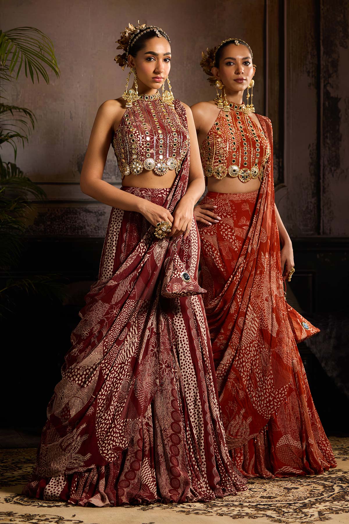 Nora Fatehi in Maroon Print and Highlighted Mermaid Saree Set