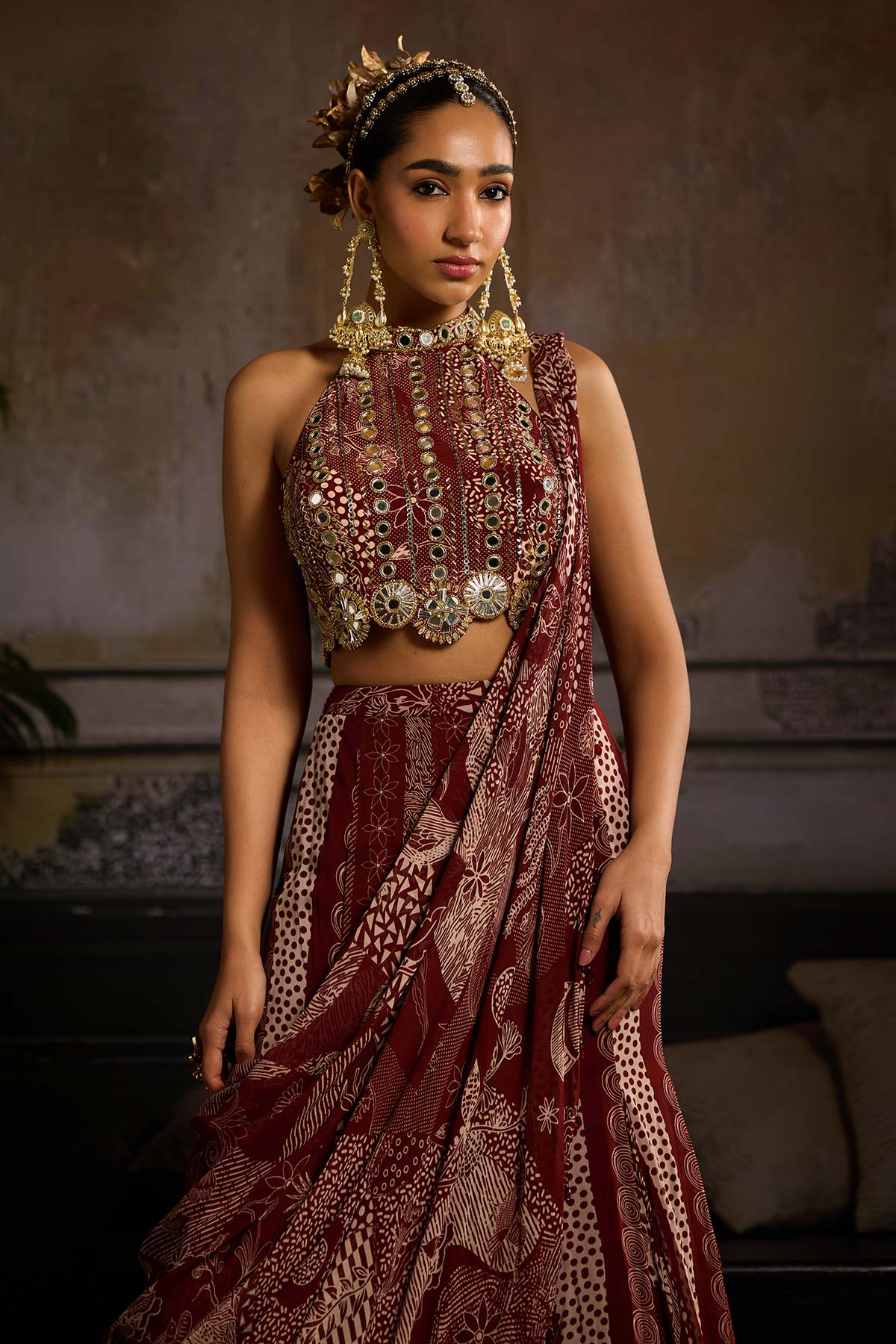 Nora Fatehi in Maroon Print and Highlighted Mermaid Saree Set