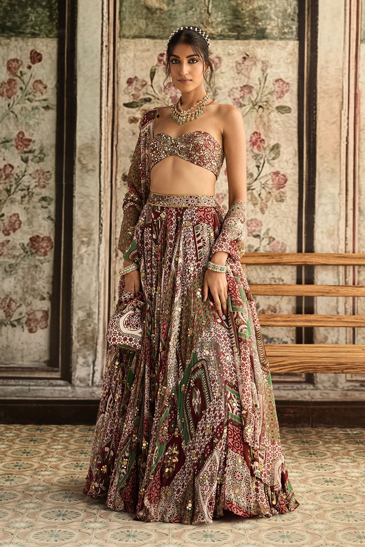 Niki Mehra in Sage-Maroon Print And Highlighted Strapless Blouse With Lehenga Set