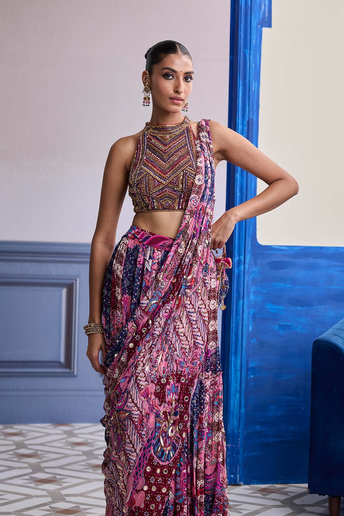 FUCHSIA EMBROIDERED BLOUSE WITH FLORAL DRAPE TIERED SAREE SET