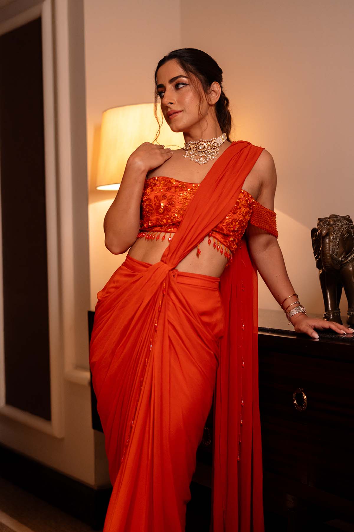 Kulveer Malhotra In Rust Orange Off Shoulder Blouse Skirt Saree