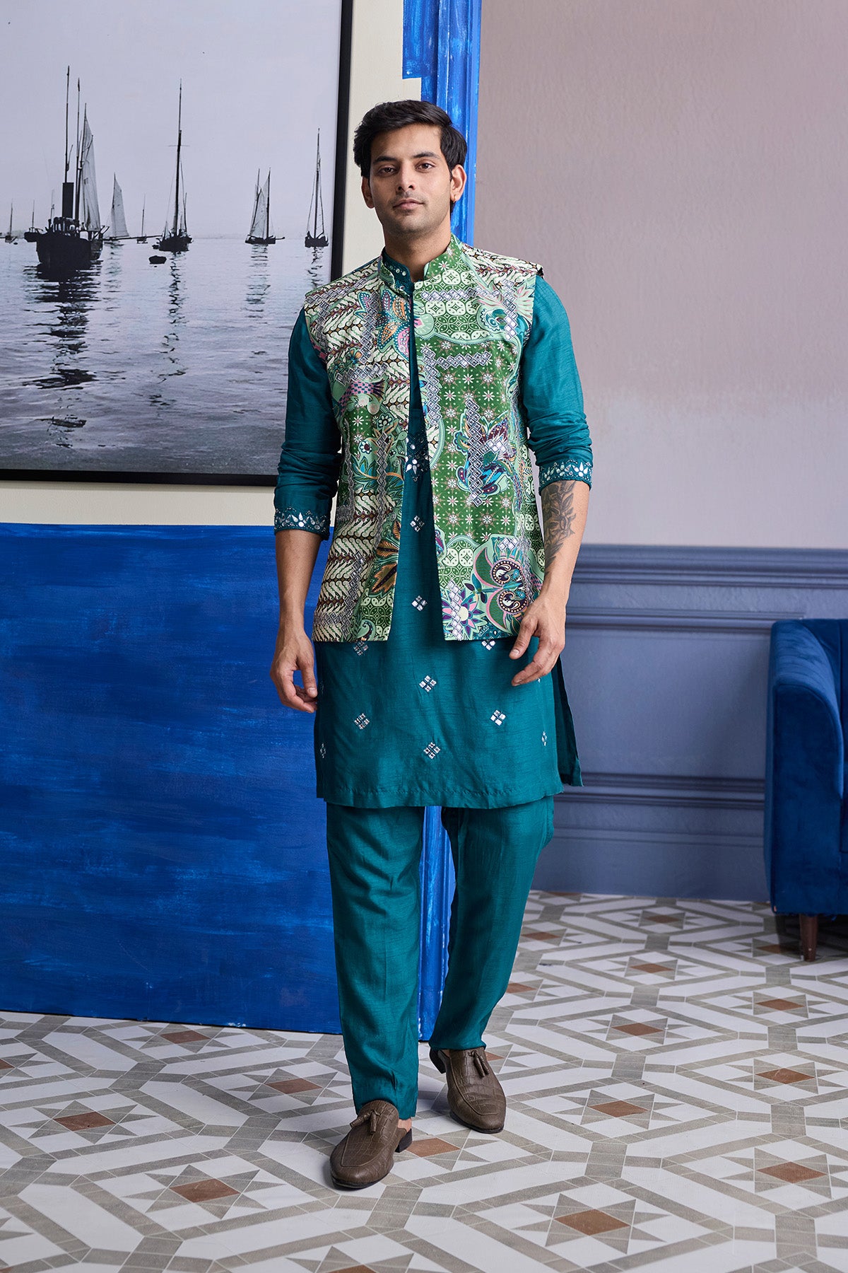 TEAL GREEN EMBROIDERED KURTA WITH PRINT HIGHLIGHTED BUNDI JACKET PAIERD WITH SOLID PANTS