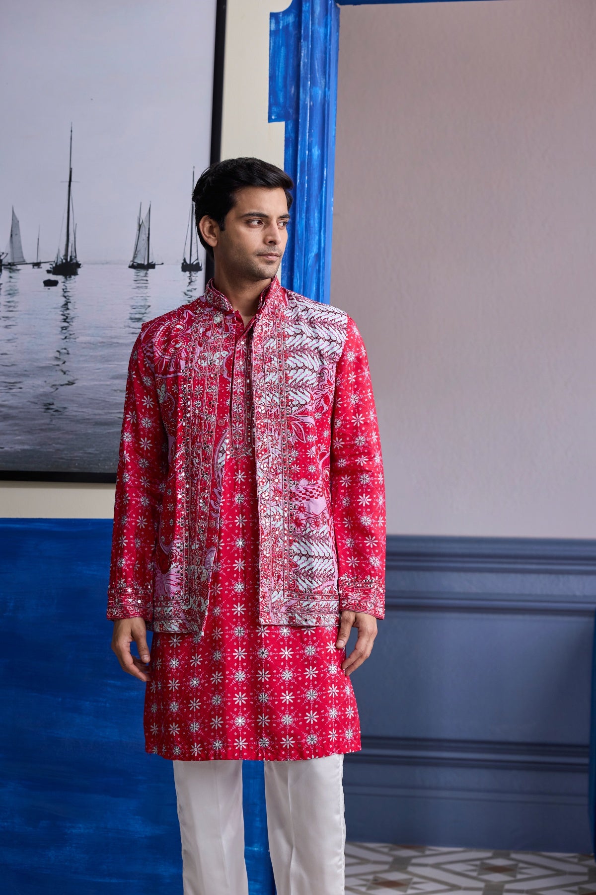 RED PRINT HIGHLIGHTED KURTA WITH PRINT EMBROIDERED BUNDI AND IVORY PANTS