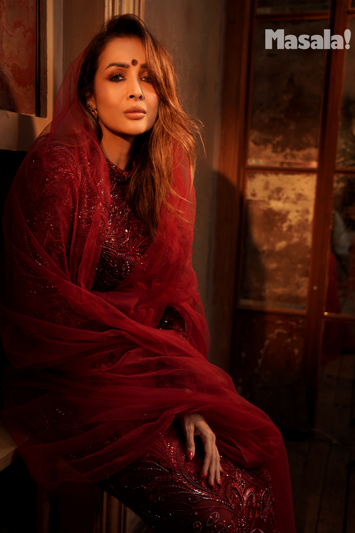 Malika Arora in Maroon Embellished Trail Skirt Set