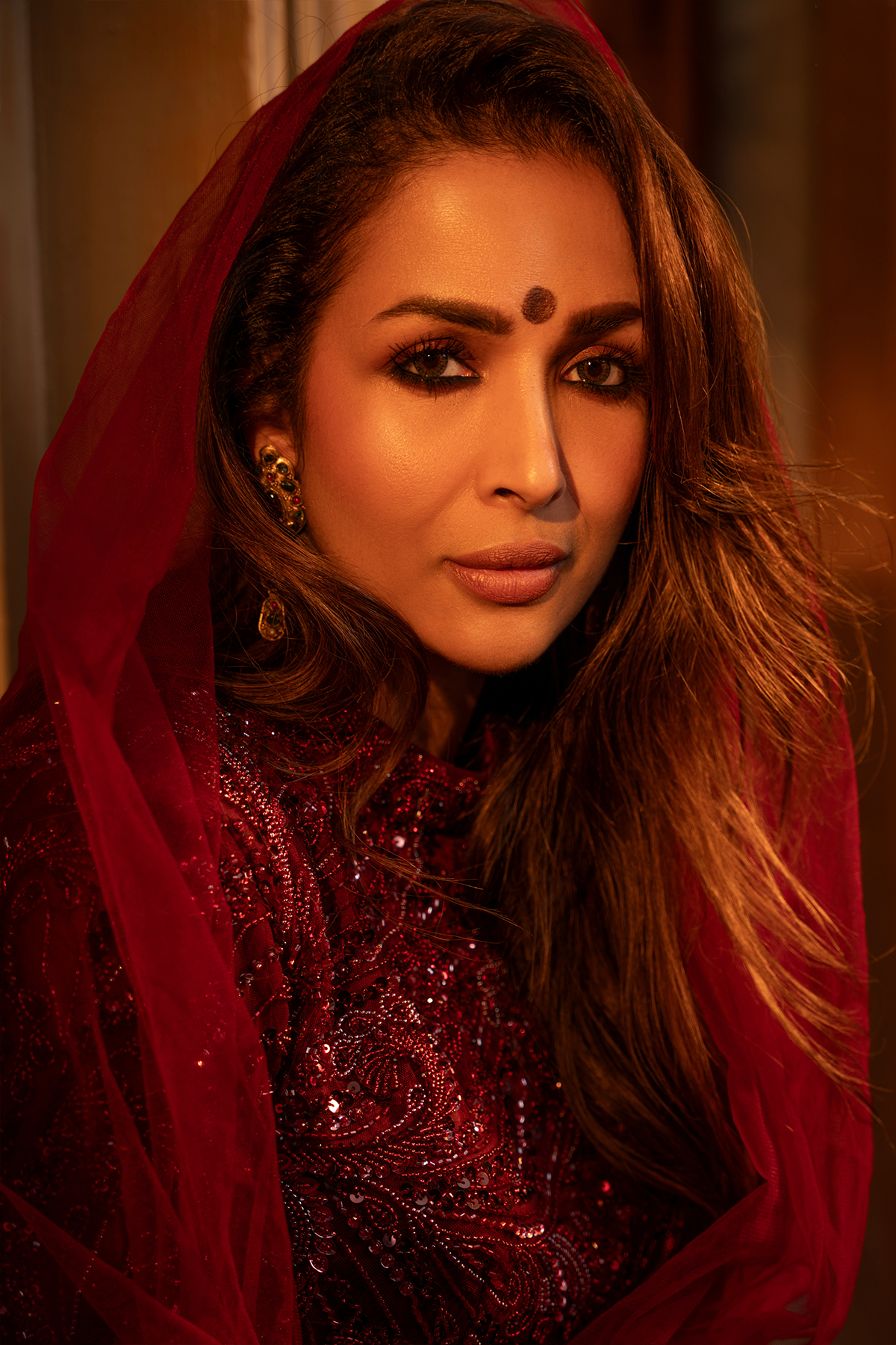 Malika Arora in Maroon Embellished Trail Skirt Set