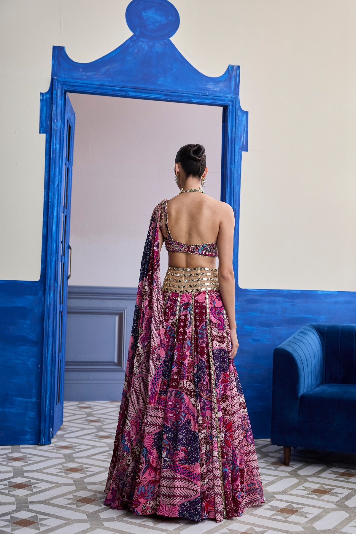 FUCHSIA FLORAL ONE-SHOULDER DRAPE BLOUSE WITH MIRROR LEHENGA SET