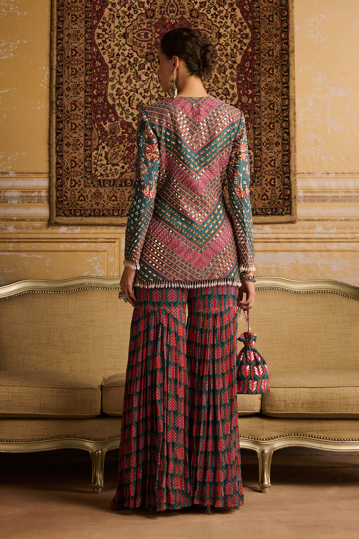 Teal highlighted jacket and Gharara pants