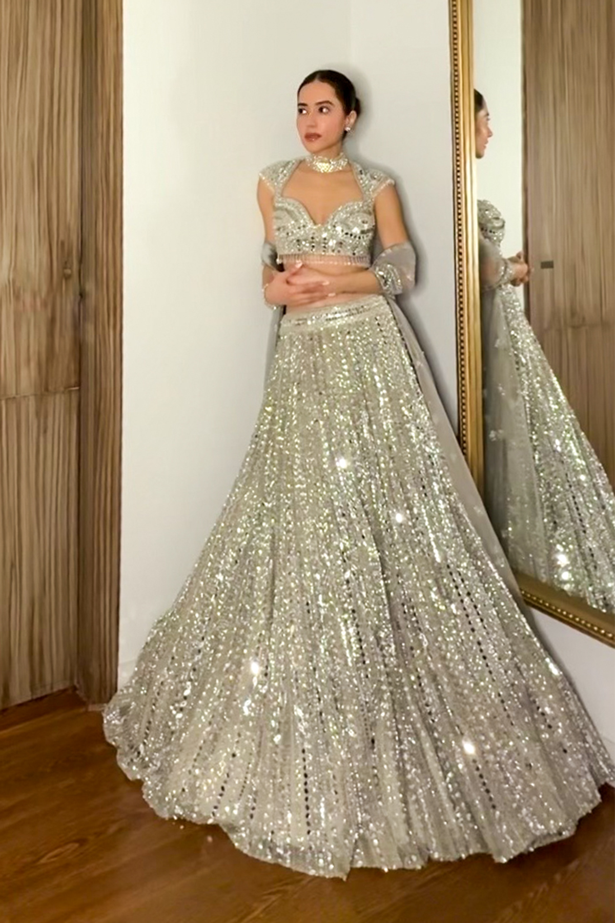Komal Kapoor in Silver Embellished Mirrorwork Lehenga Set