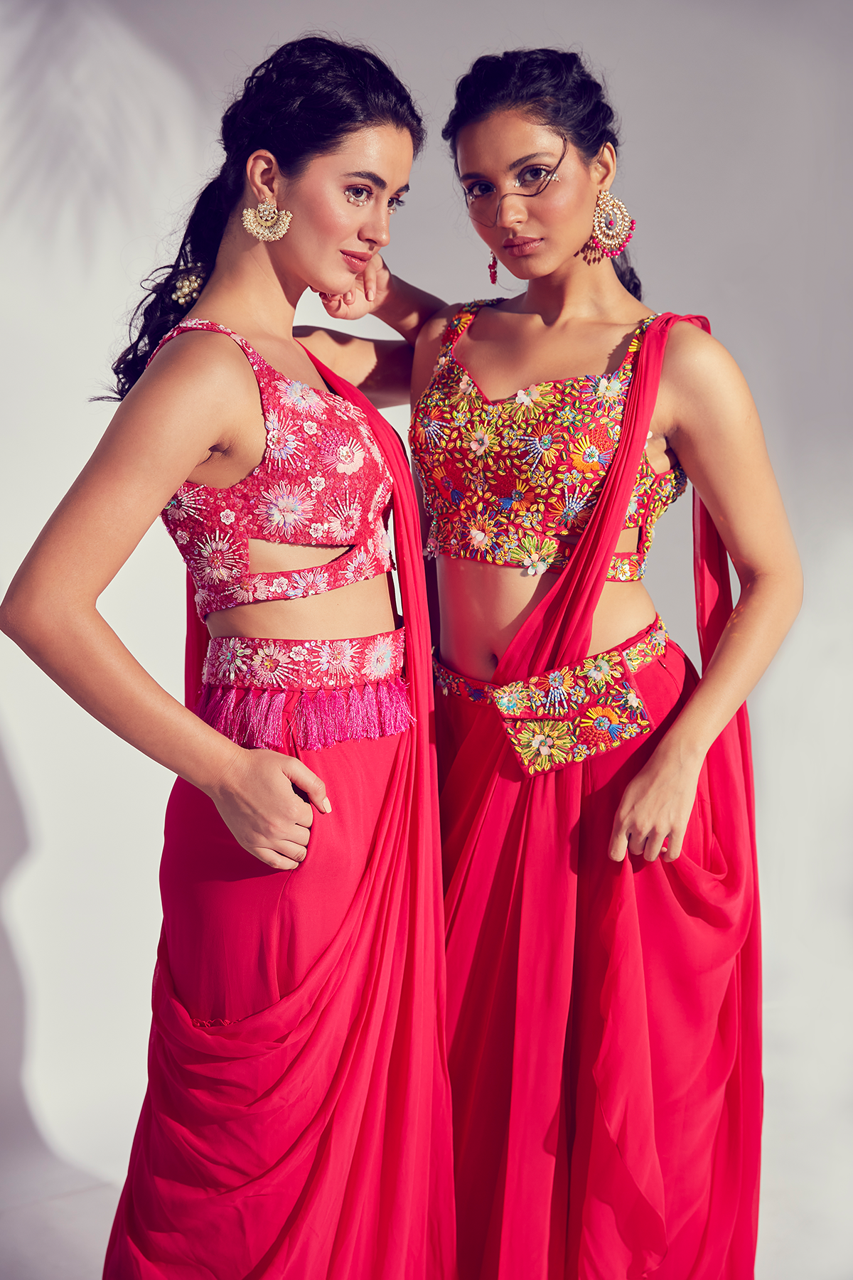 HOT PINK 3D SELF ON SELF EMBROIDERED CUT OUT BLOUSE WITH PRESTICHED TIERED PANTS SAREE & EMBROIDERED TASSEL BELT
