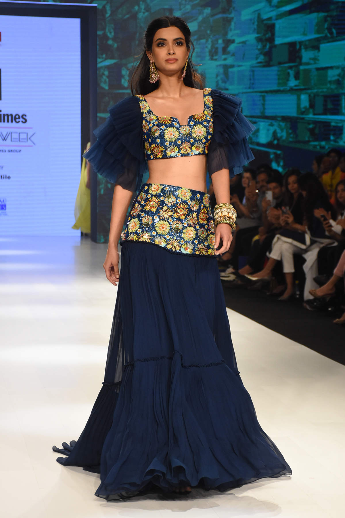 Navy Blue Pleated Tulle sleeved 3D Embroidered Blouse & Embroidered Bask Lehenga