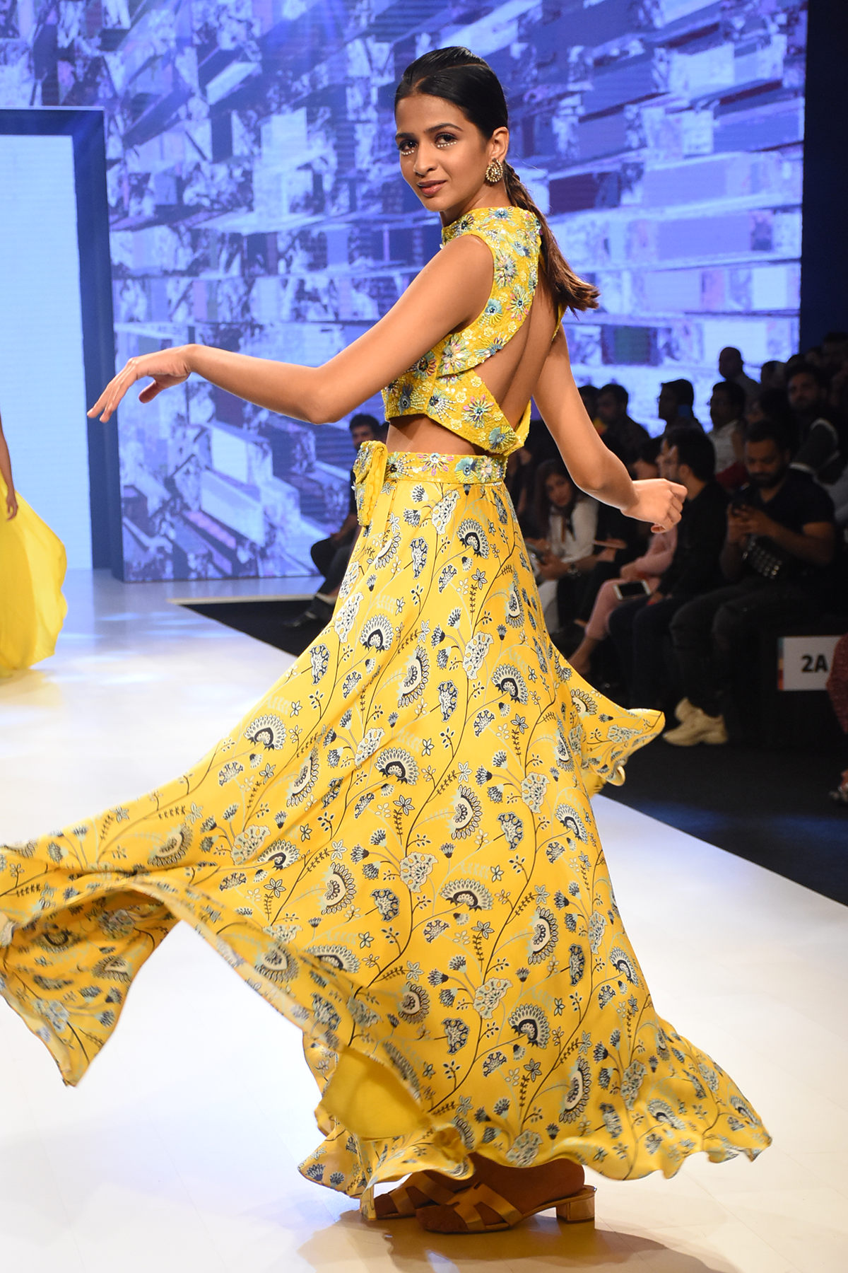 Yellow Jaal Printed Lehenga With Blue and Yellow 3D Embroidered Blouse & Bag Belt
