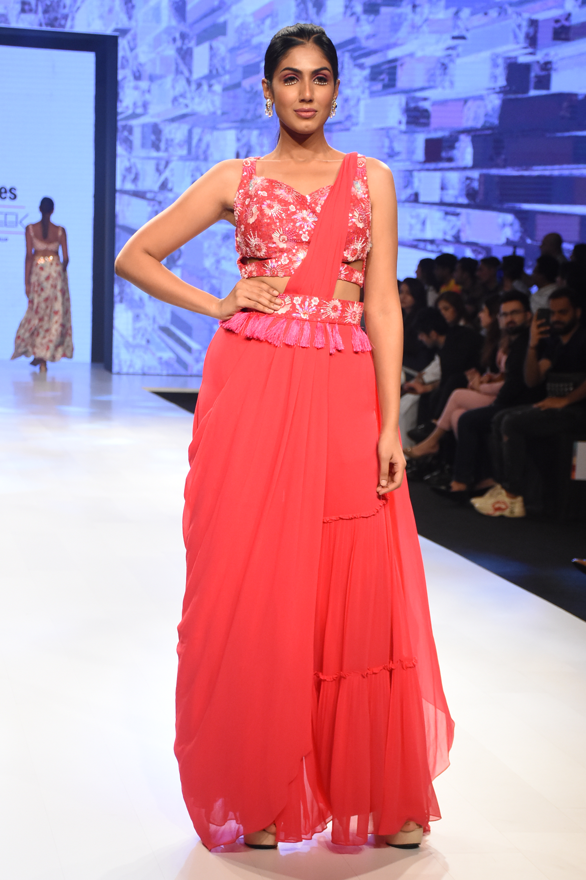 HOT PINK 3D SELF ON SELF EMBROIDERED CUT OUT BLOUSE WITH PRESTICHED TIERED PANTS SAREE & EMBROIDERED TASSEL BELT