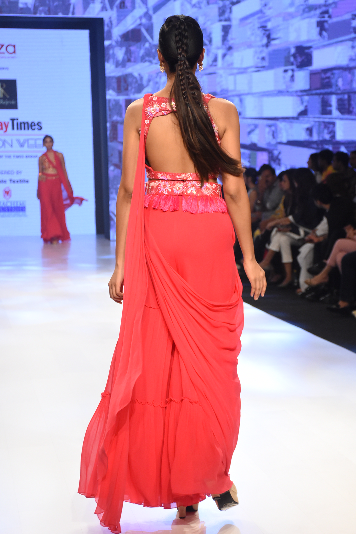 HOT PINK 3D SELF ON SELF EMBROIDERED CUT OUT BLOUSE WITH PRESTICHED TIERED PANTS SAREE & EMBROIDERED TASSEL BELT