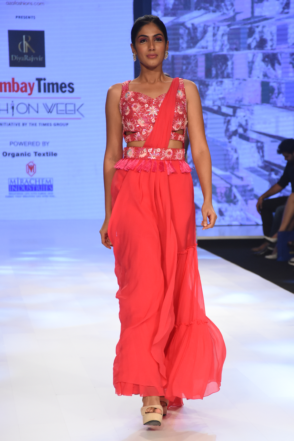 HOT PINK 3D SELF ON SELF EMBROIDERED CUT OUT BLOUSE WITH PRESTICHED TIERED PANTS SAREE & EMBROIDERED TASSEL BELT