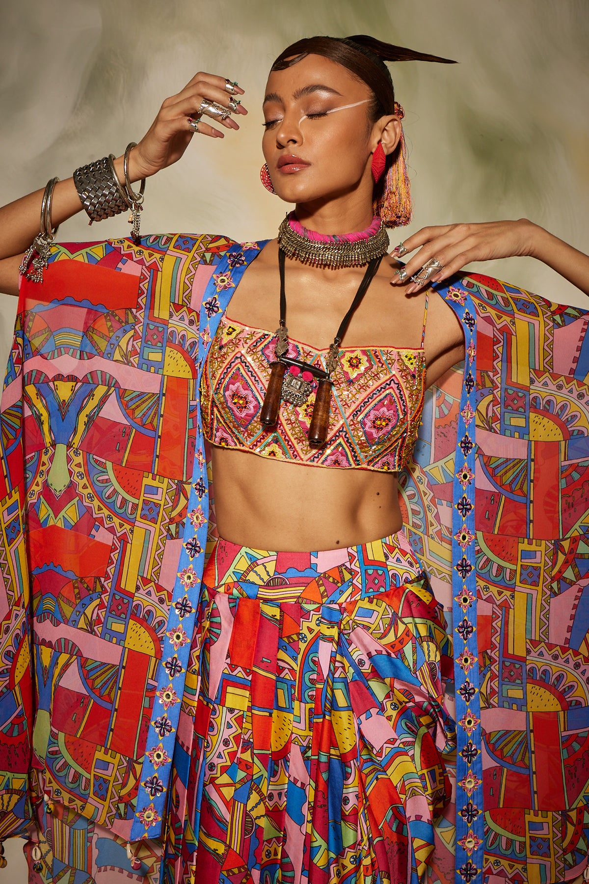 Pink & Blue geometric print front open cape detailed with tassels and dhoti skirt