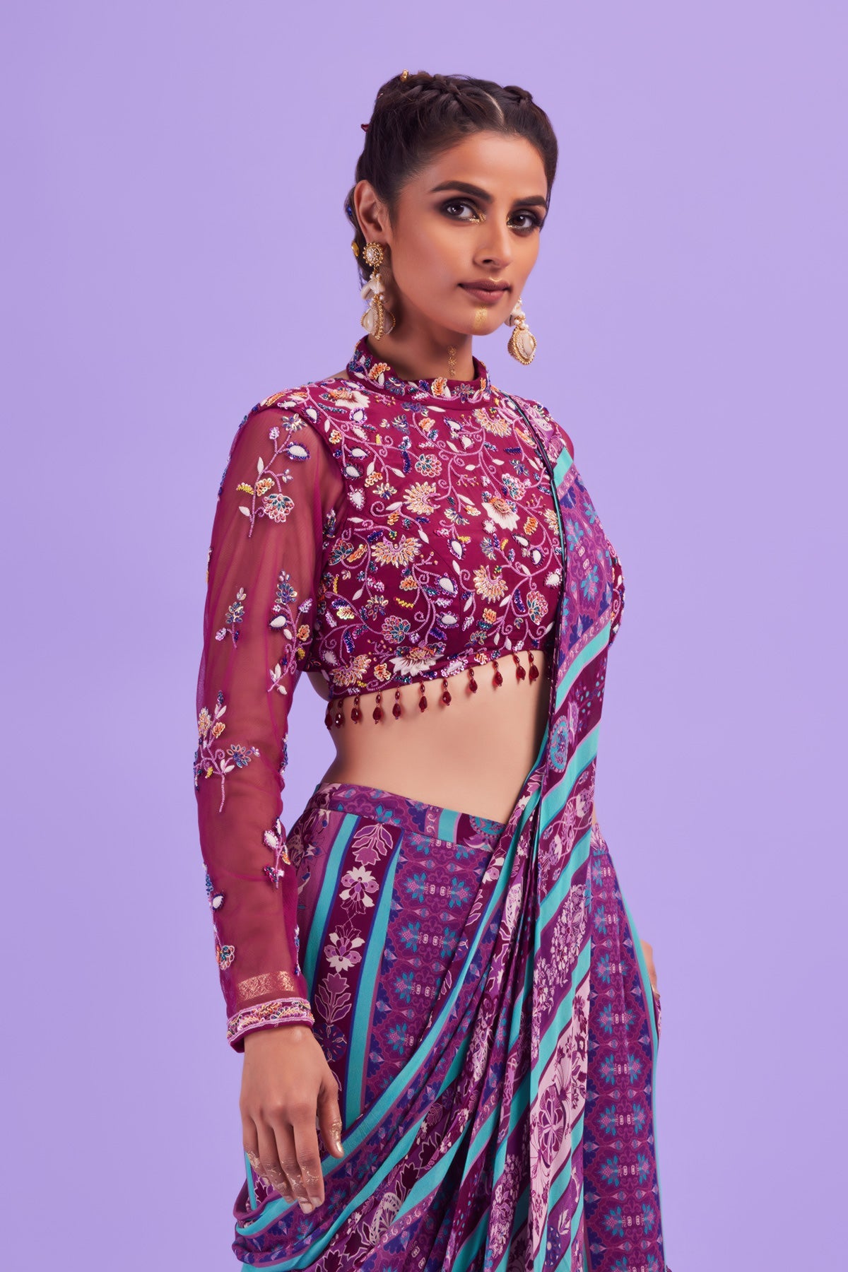 Purple Thread & Cutdana Floral Embroidered Blouse with Purple & Green Stripped Print Gharara Sari