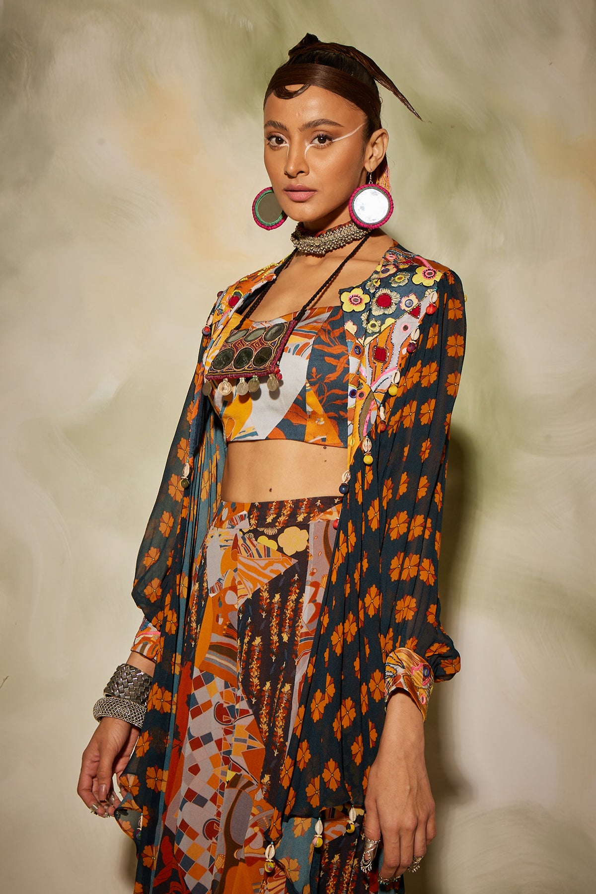 Brown & rust aztec printed busteir and sharara pants & potali bag