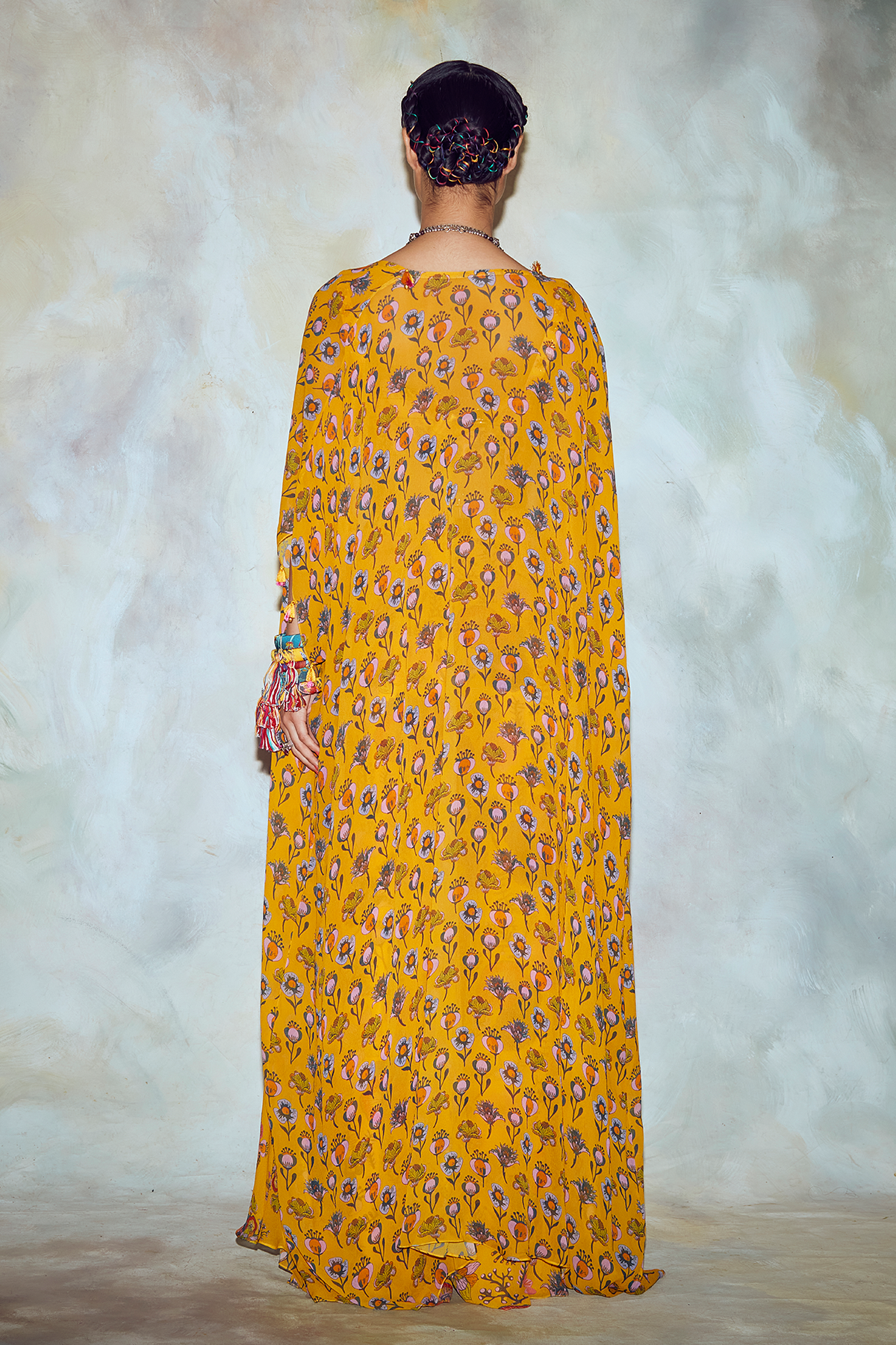 Madhuri Dixit in Yellow Border Print Cape Set