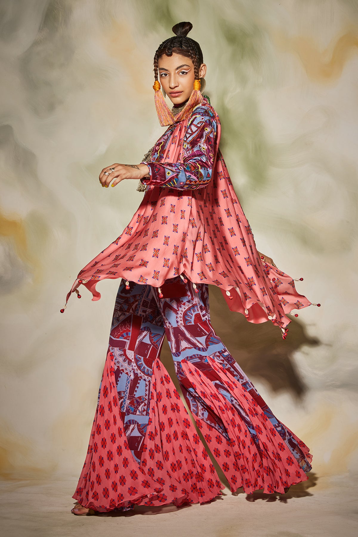 Purple geometric printed godet pants, cape & printed leather belt