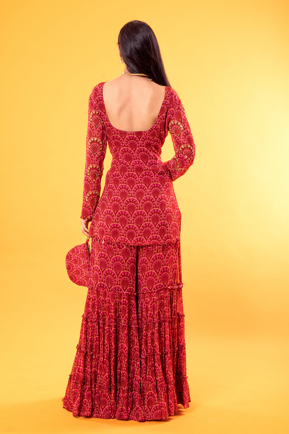 Maroon Fan Printed Kurti With Tiered Sharara & Embroidered Potli Bag