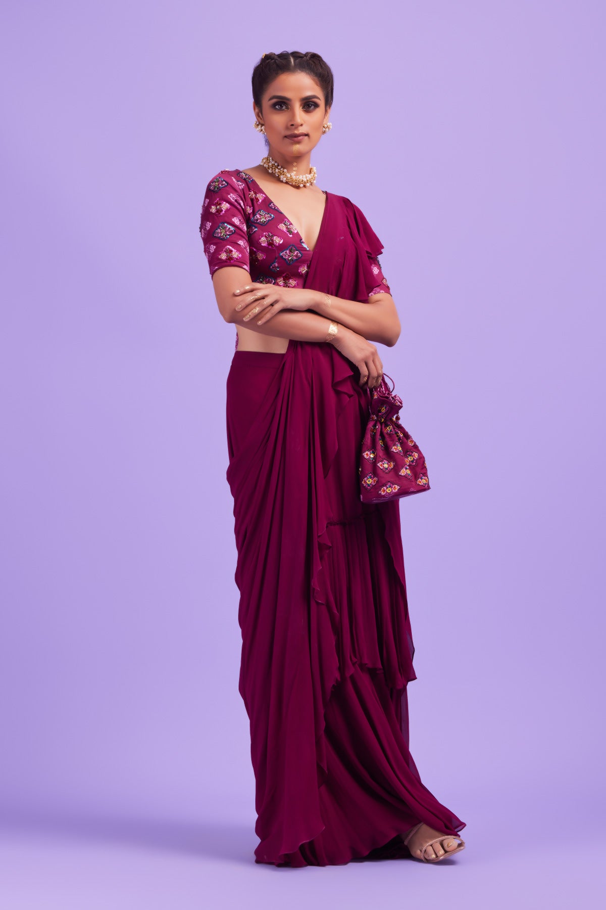 Purple Butta Highlighted Blouse with Purple Layer Ruffle Sari & Potli Bag