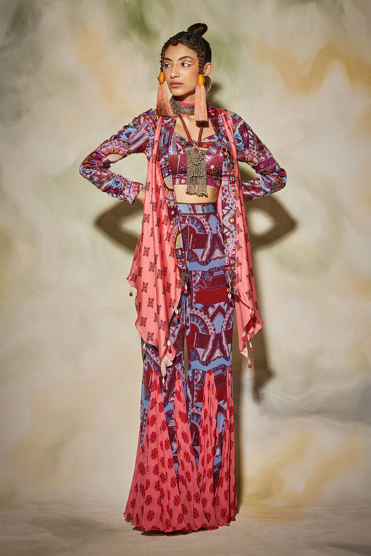 Purple geometric printed godet pants, cape & printed leather belt