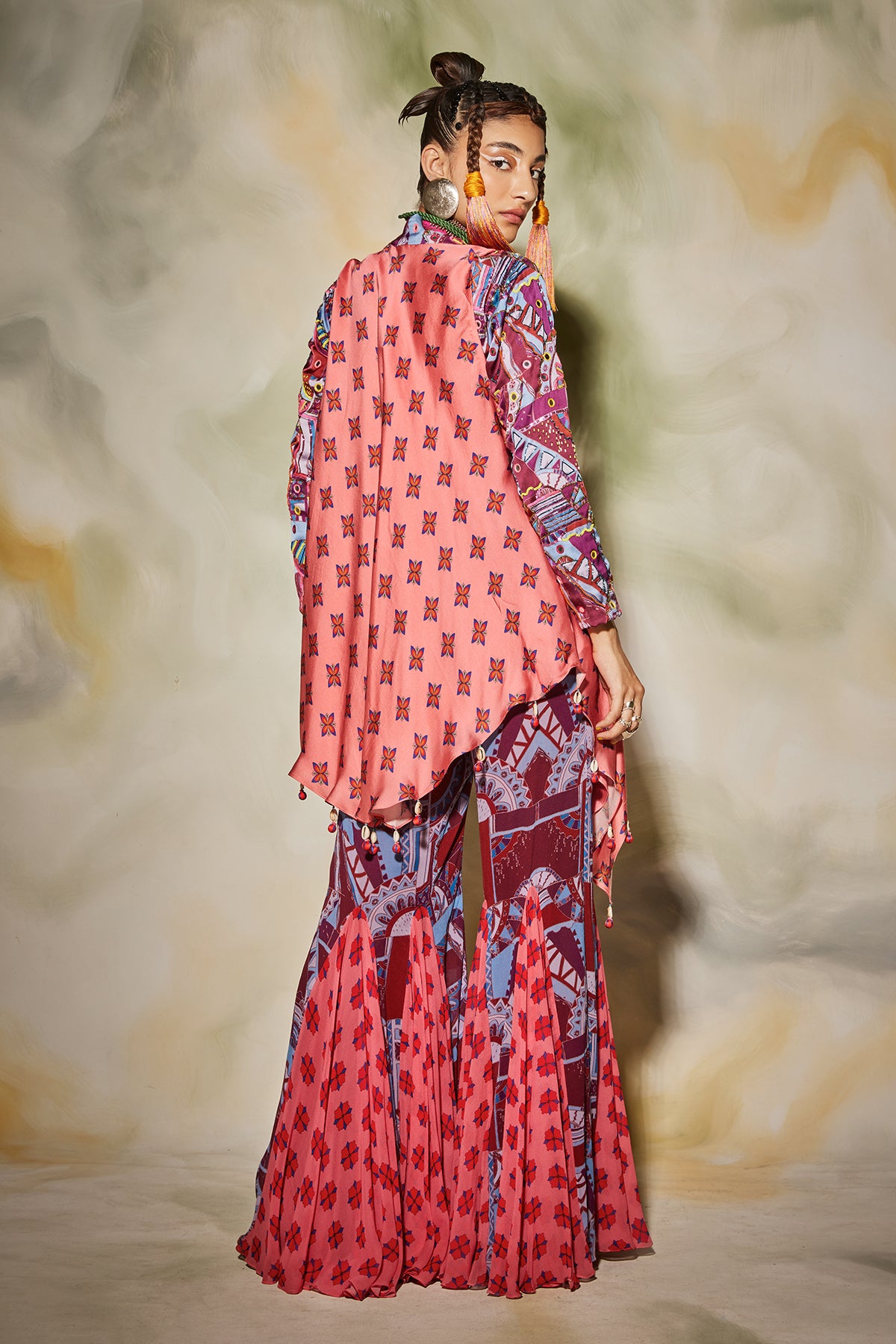 Purple geometric printed godet pants, cape & printed leather belt