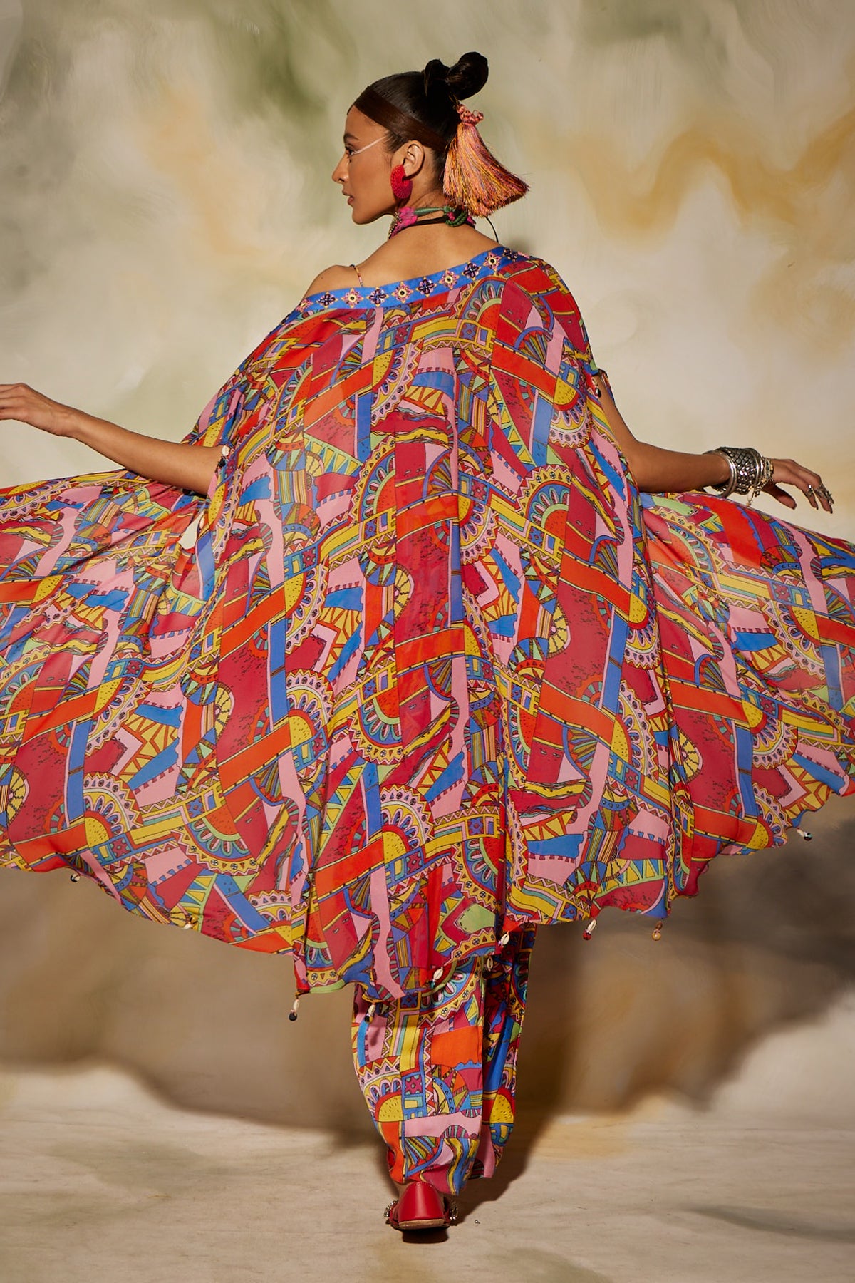Pink & Blue geometric print front open cape detailed with tassels and dhoti skirt