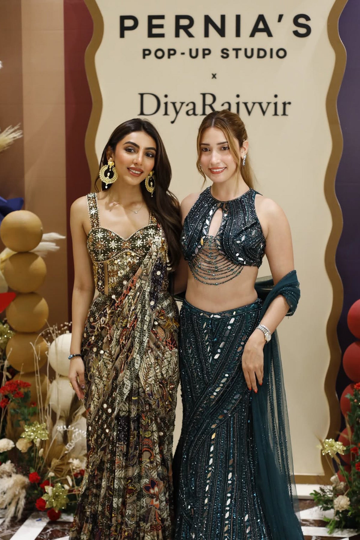 MALLAIKA CHHEDA IN OLIVE PRINT CORSET WITH DRAPE TIERED SKIRT SAREE SET