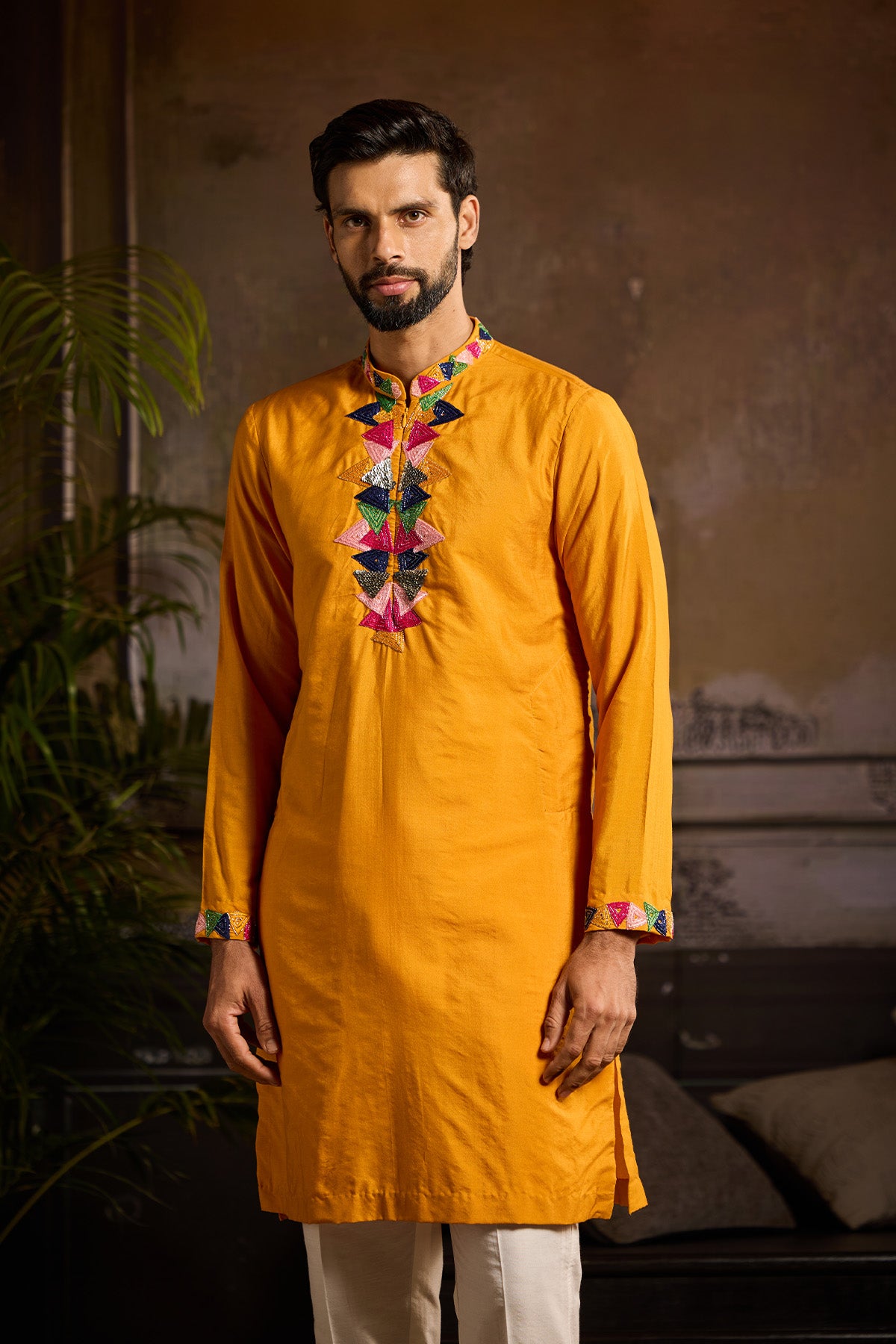 YELLOW WITH COLORFUL TRIANGLE PLACKET EMBROIDERED KURTA DETAILED WITH ZIP PAIRED AND IVORY PANTS