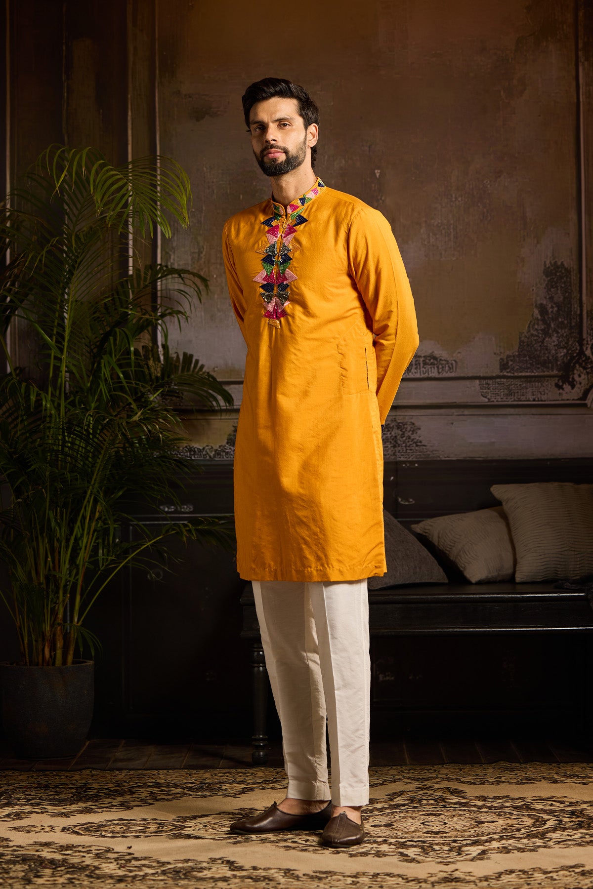 YELLOW WITH COLORFUL TRIANGLE PLACKET EMBROIDERED KURTA DETAILED WITH ZIP PAIRED AND IVORY PANTS