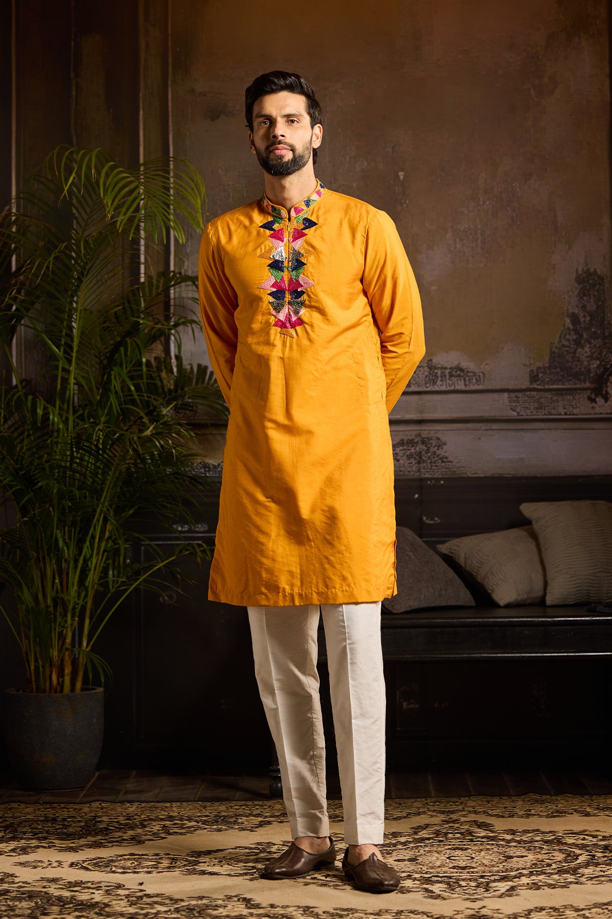 YELLOW WITH COLORFUL TRIANGLE PLACKET EMBROIDERED KURTA DETAILED WITH ZIP PAIRED AND IVORY PANTS