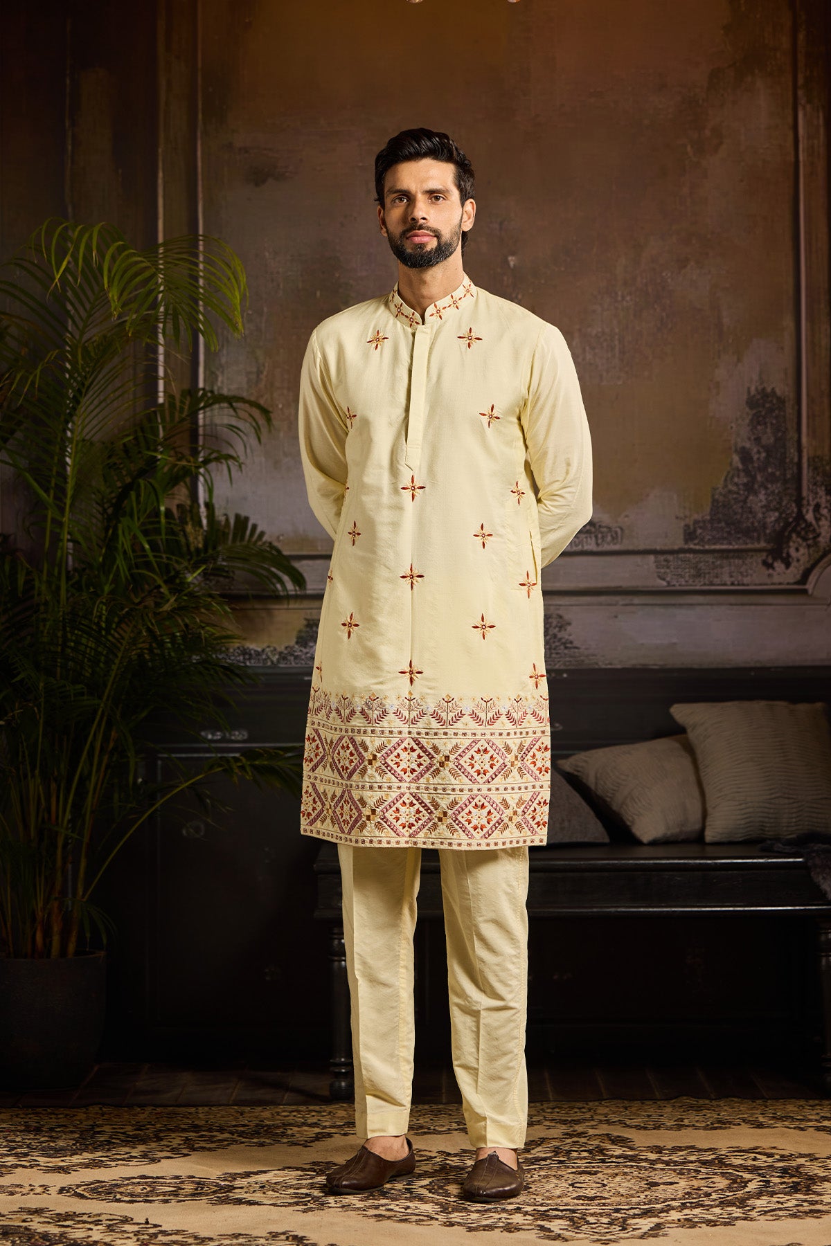 PASTEL YELLOW  TRIBLE EMBROIDERED KURTA  PAIRED WITH PASTEL YELLOW PANTS