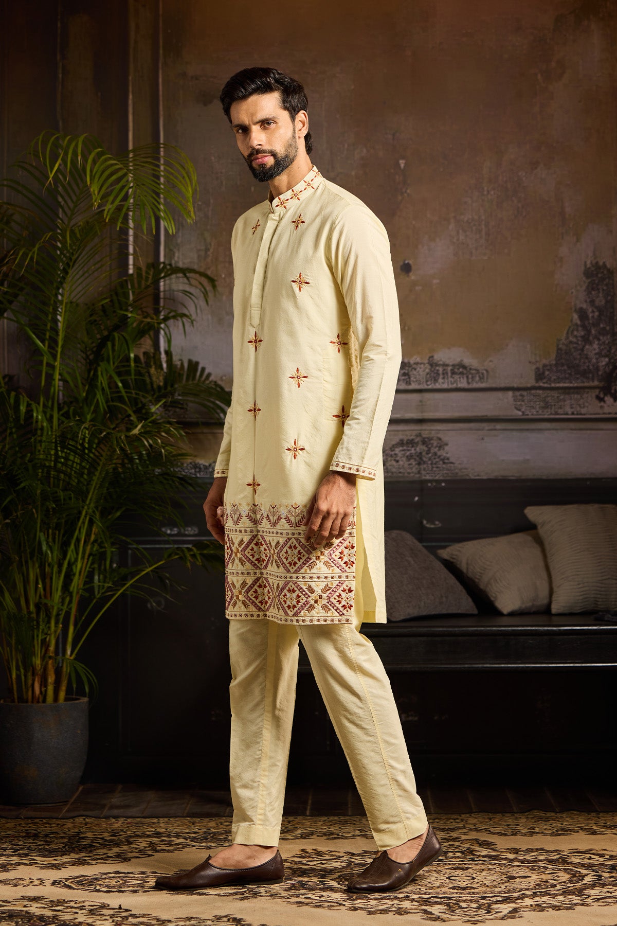 PASTEL YELLOW  TRIBLE EMBROIDERED KURTA  PAIRED WITH PASTEL YELLOW PANTS