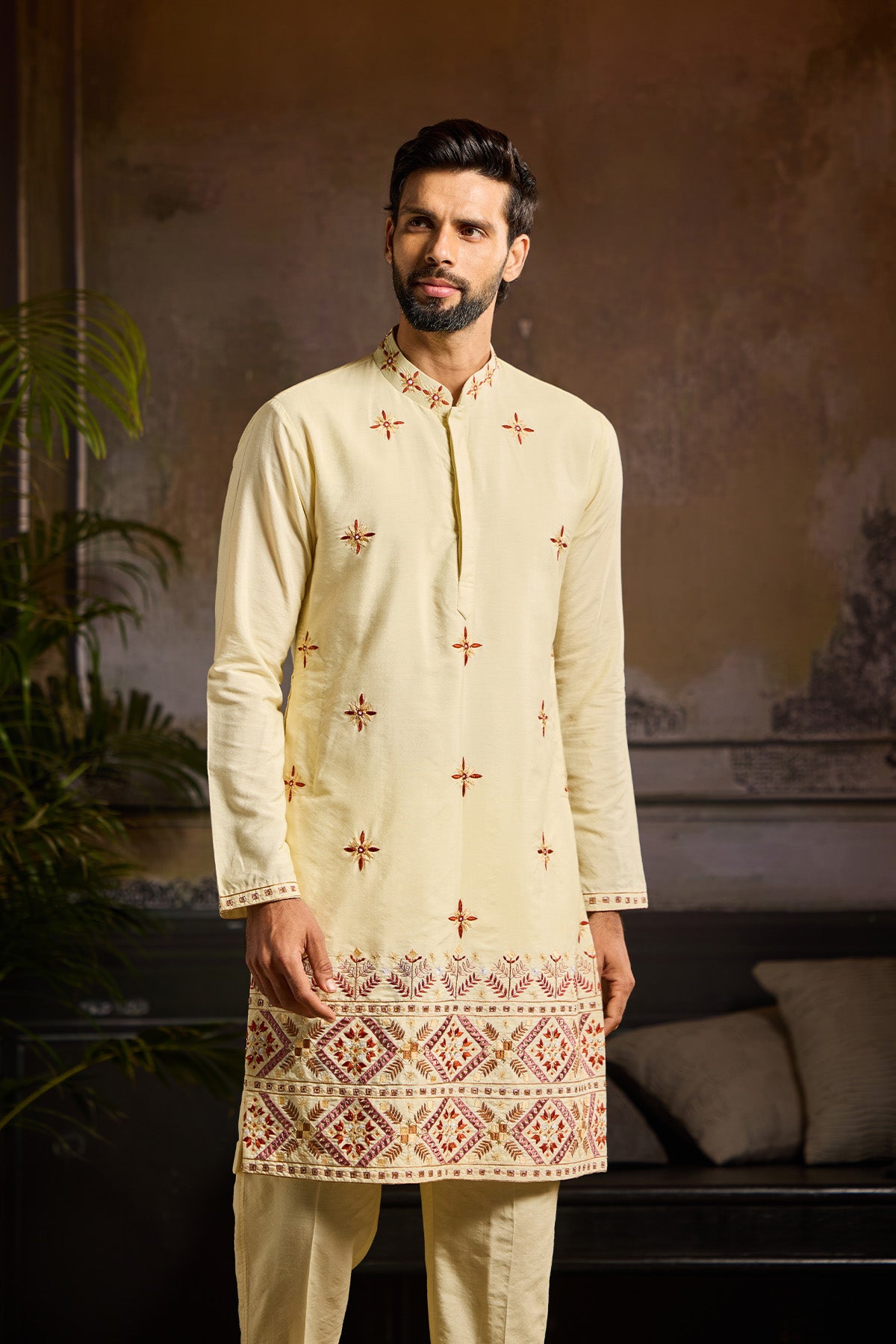 PASTEL YELLOW  TRIBLE EMBROIDERED KURTA  PAIRED WITH PASTEL YELLOW PANTS