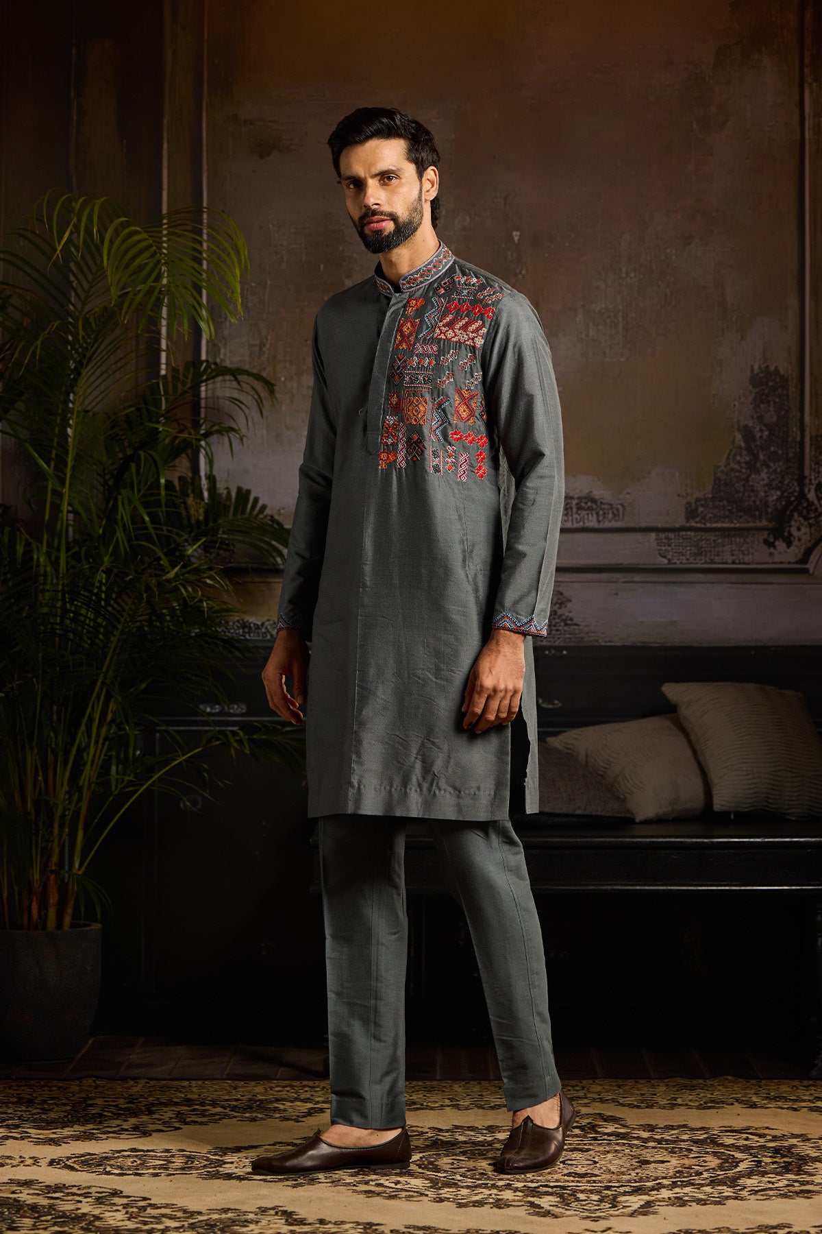 GREY WITH COLORFULL TRIBLE EMBROIDERED KURTA PAIRED WITH GREY PANTS