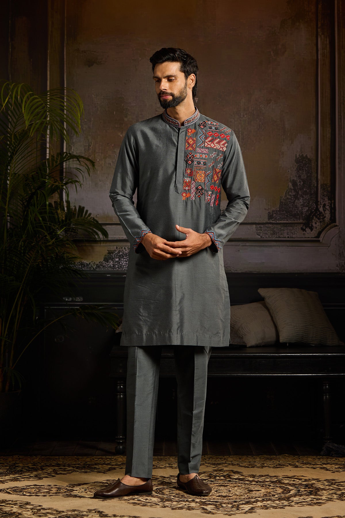 GREY WITH COLORFULL TRIBLE EMBROIDERED KURTA PAIRED WITH GREY PANTS