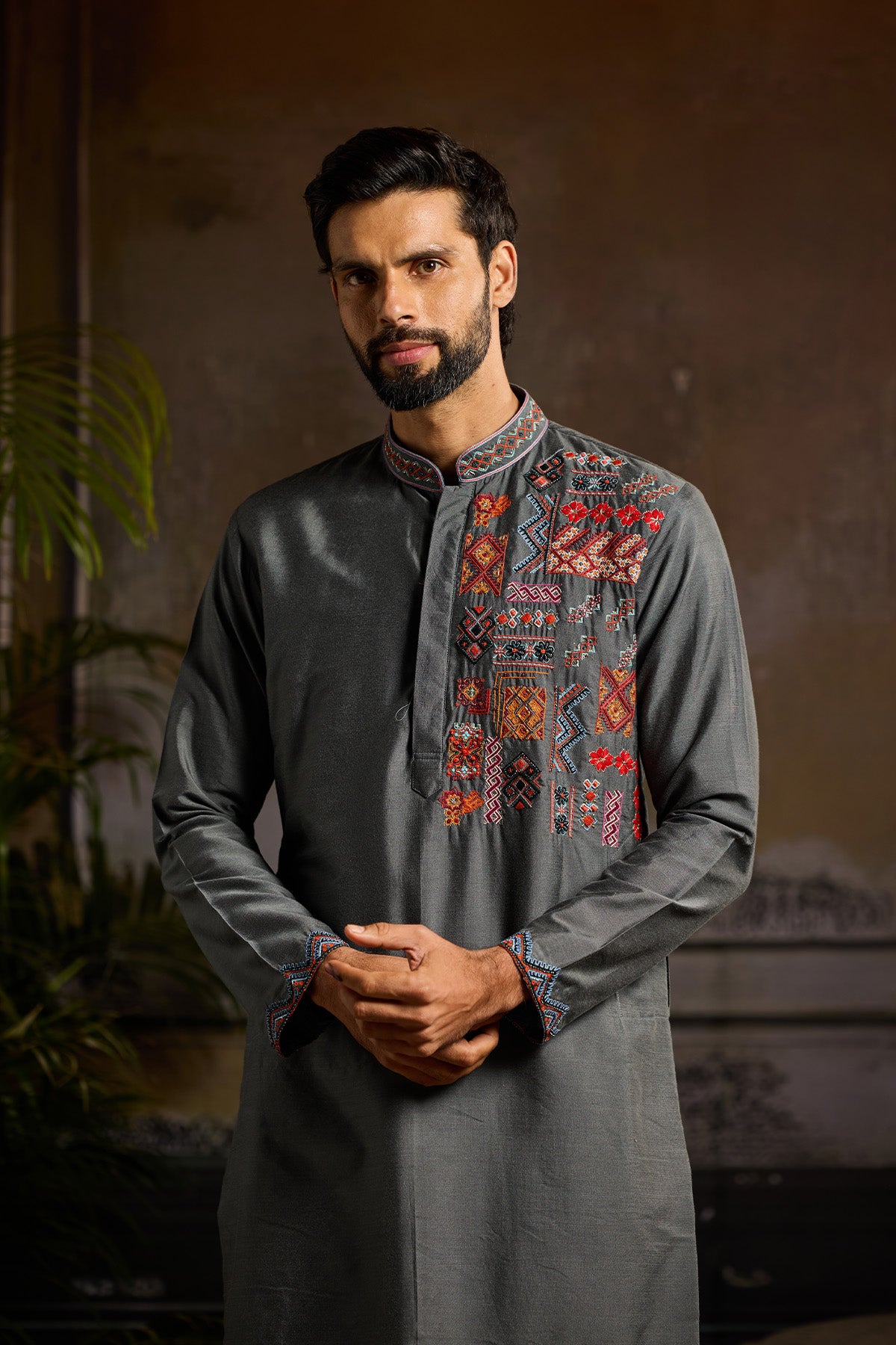 GREY WITH COLORFULL TRIBLE EMBROIDERED KURTA PAIRED WITH GREY PANTS