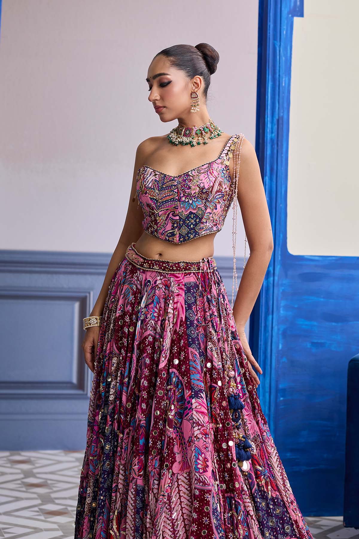 FUCHSIA FLORAL CORSET WITH HIGHLIGHTED LEHENGA SET