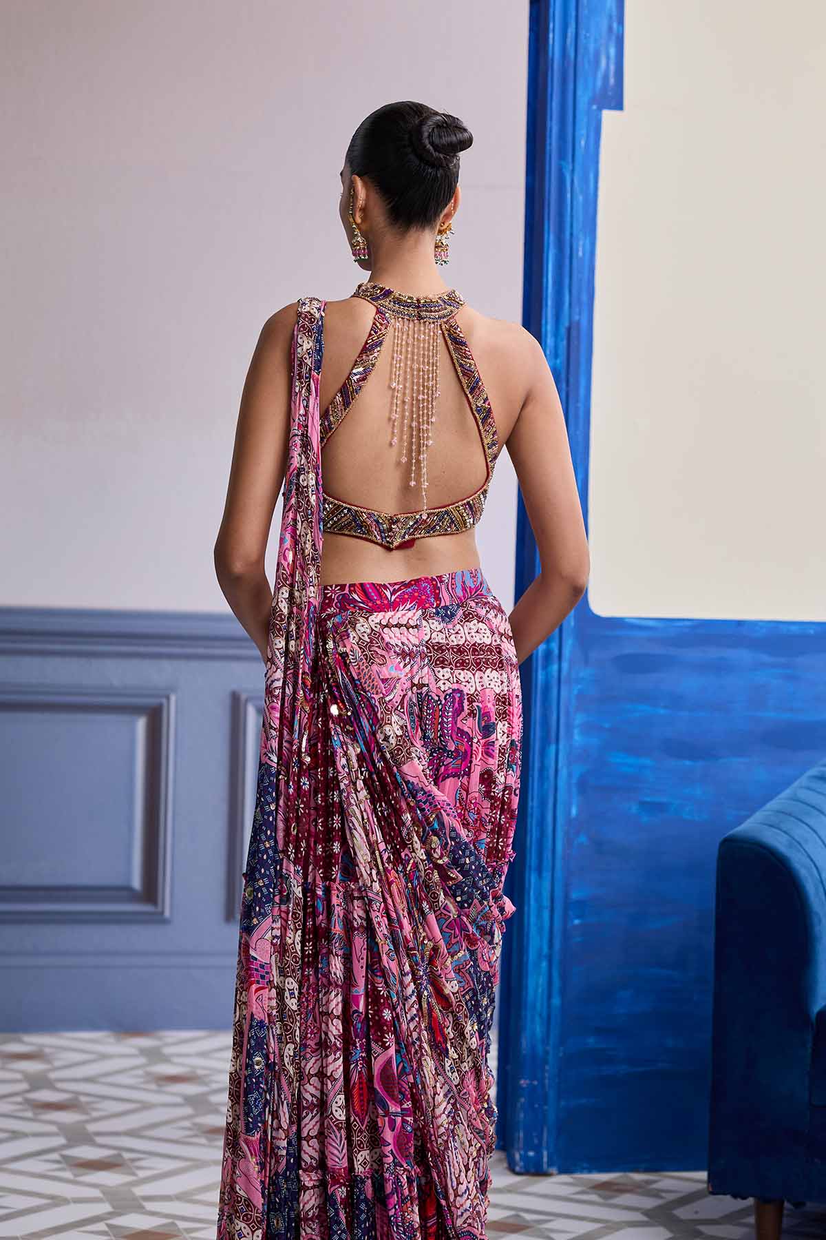 FUCHSIA EMBROIDERED BLOUSE WITH FLORAL DRAPE TIERED SAREE SET