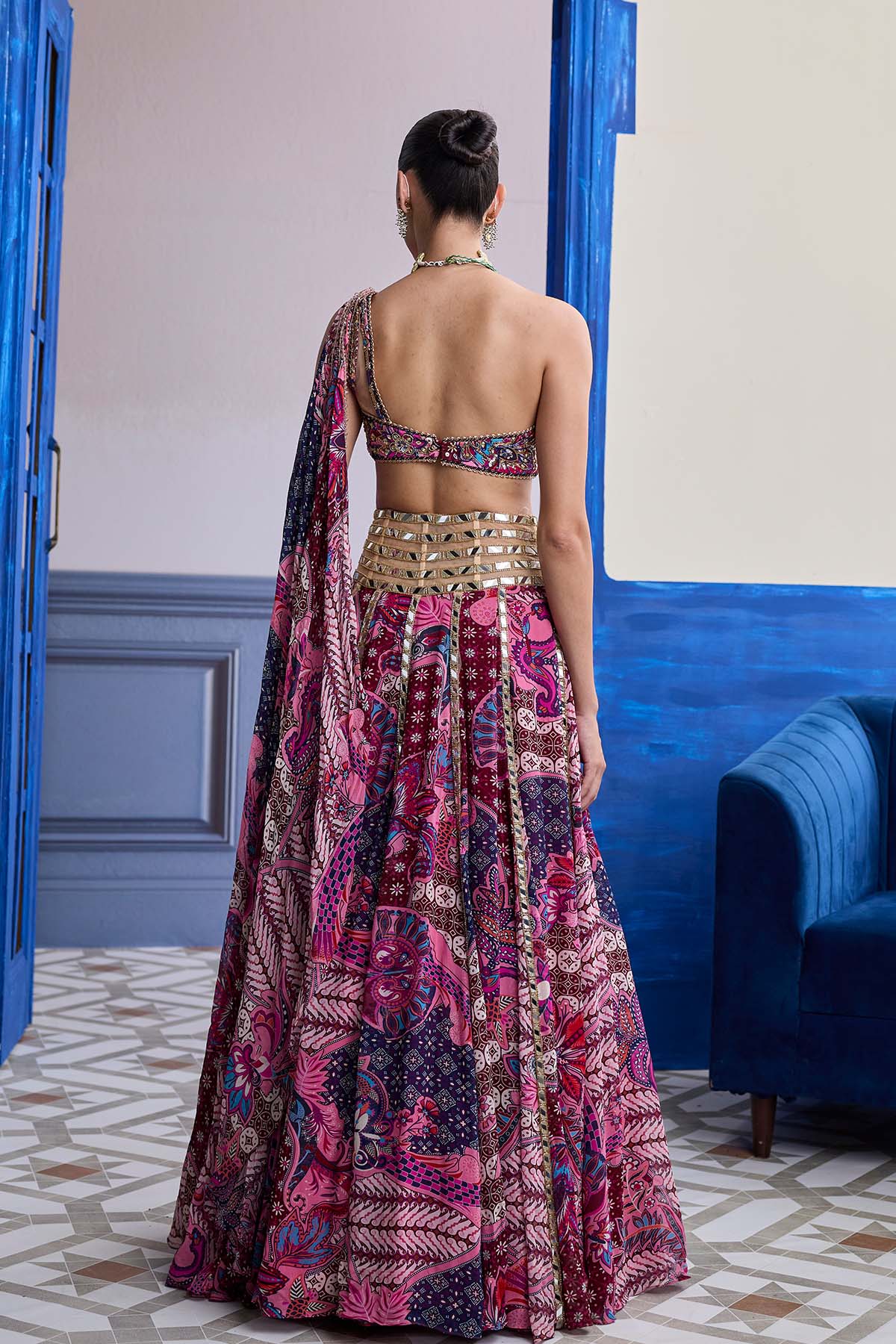 FUCHSIA FLORAL ONE-SHOULDER DRAPE BLOUSE WITH MIRROR LEHENGA SET
