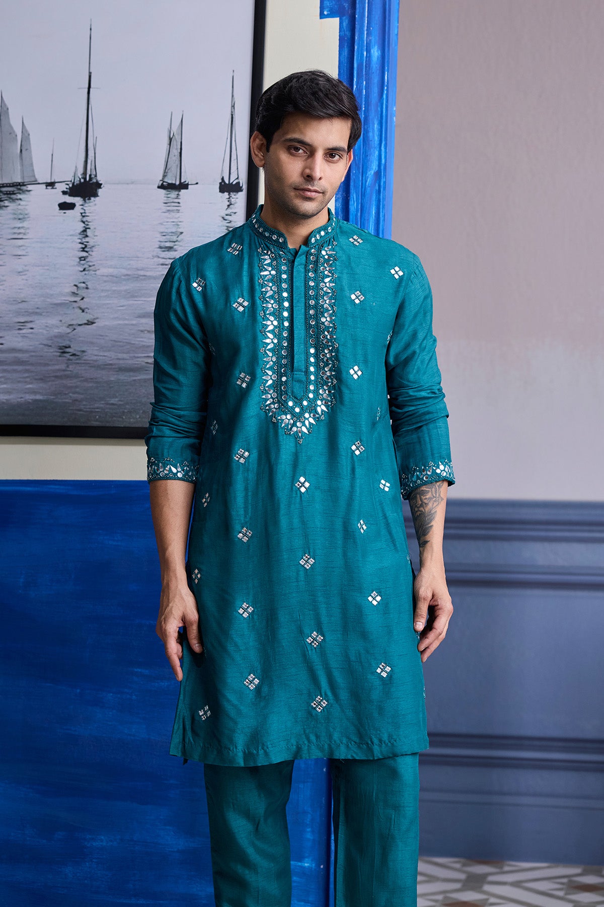 TEAL GREEN EMBROIDERED KURTA WITH PRINT HIGHLIGHTED BUNDI JACKET PAIERD WITH SOLID PANTS