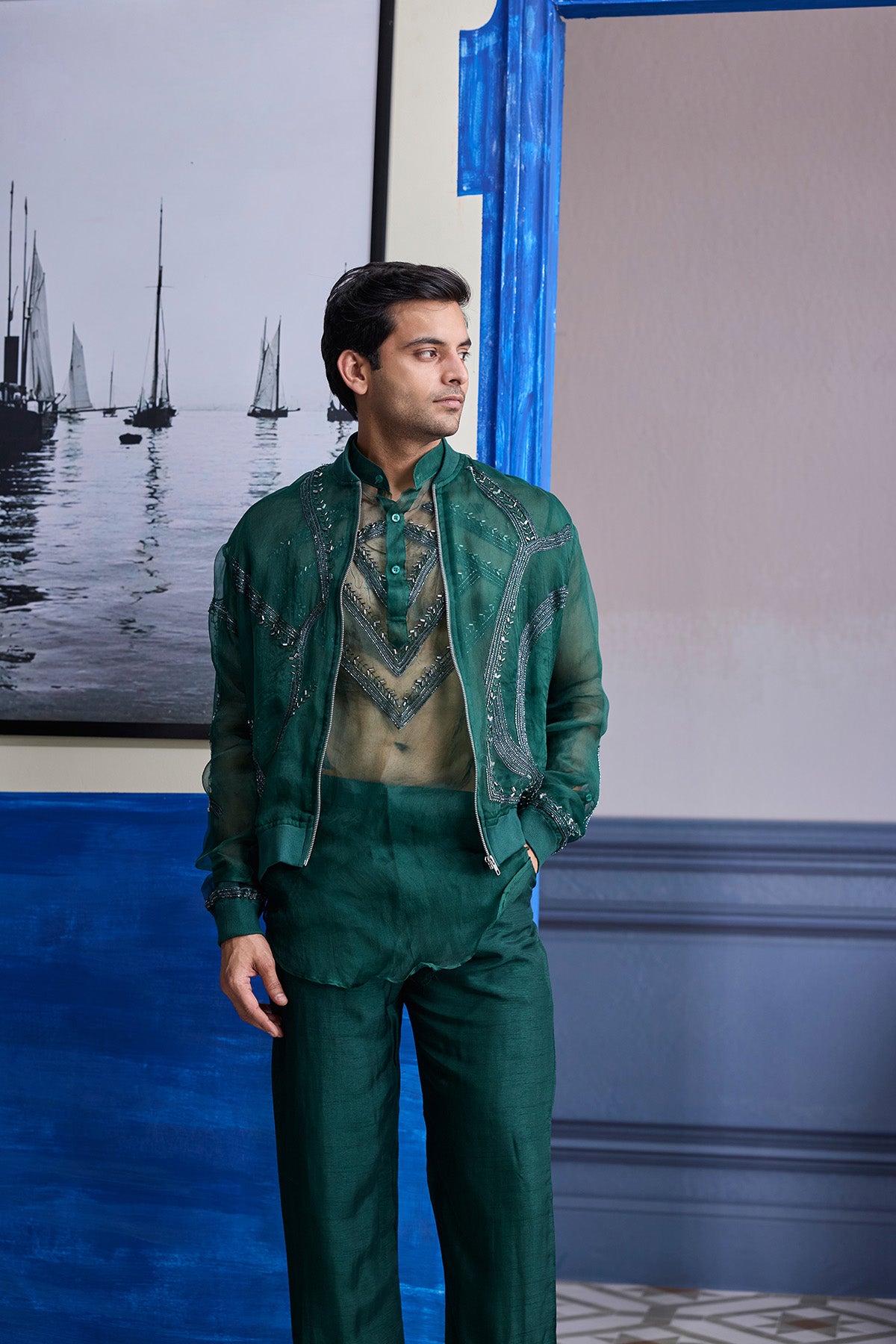 DRAK GREEN ORGANZA KURTA WITH EMBROIDERED ORGANZA BOMBER JACKET PAIRED WITH SOLID PANTS