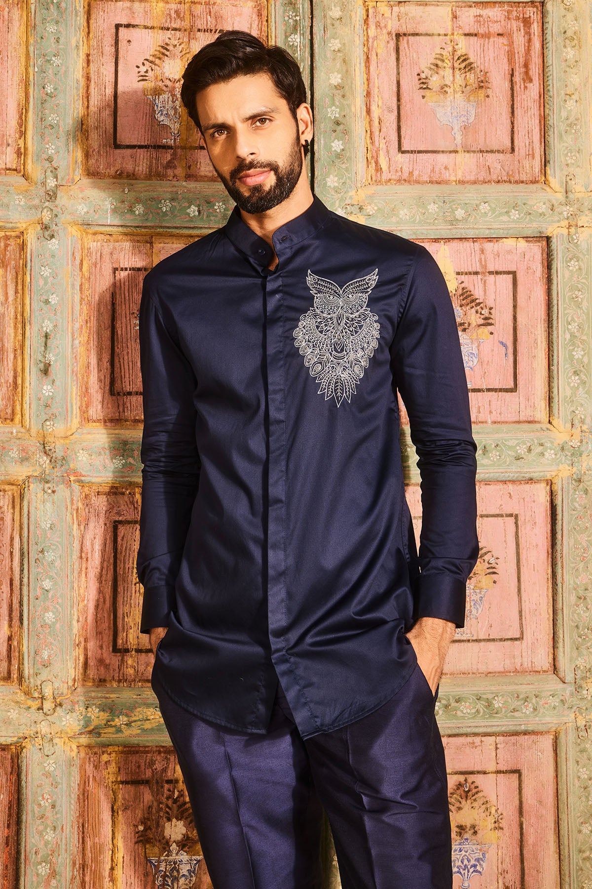 Dark blue embroidered shirt and black pant