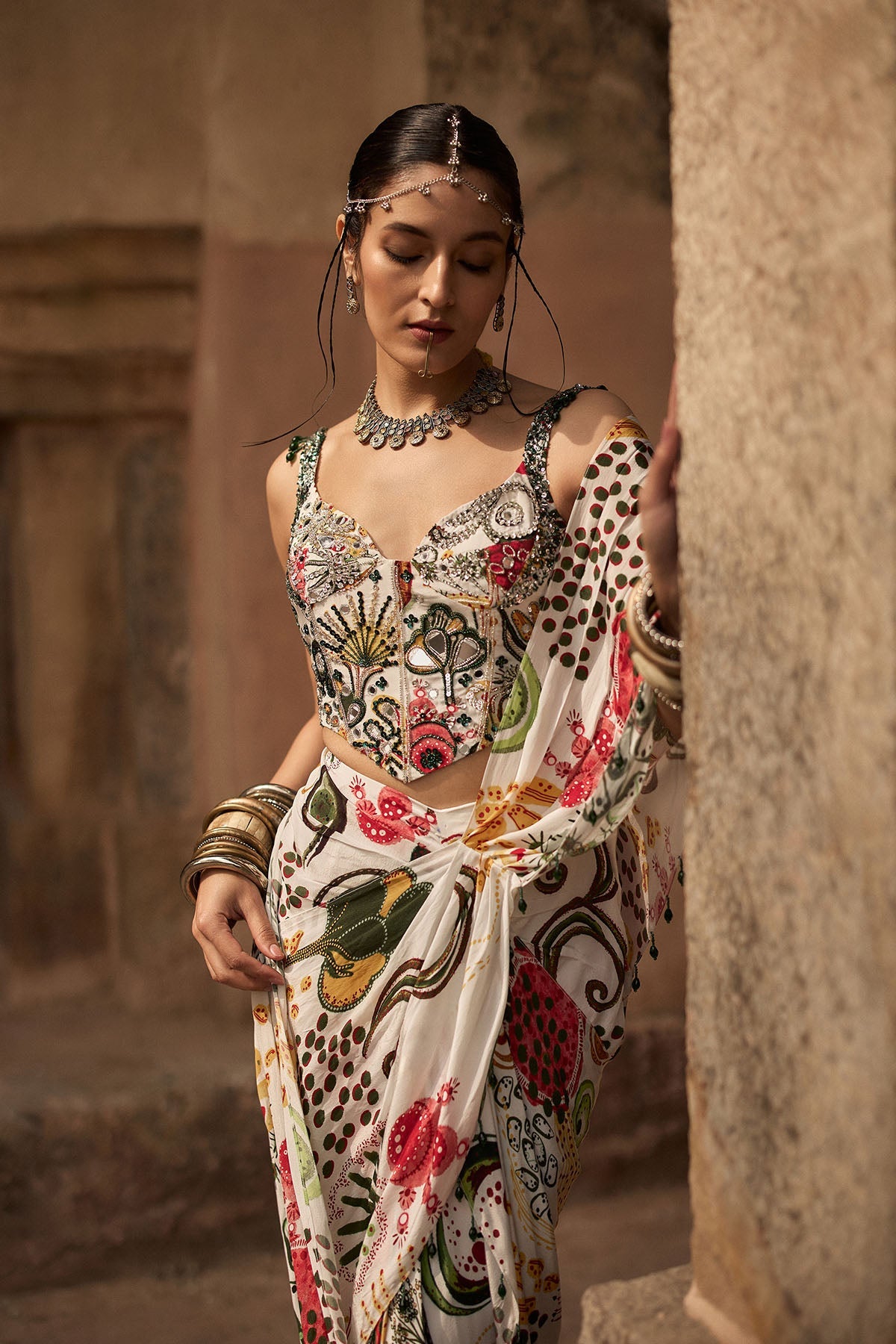 Ivory Print And Highlighted Corset With  Dhoti Skirt Saree Set