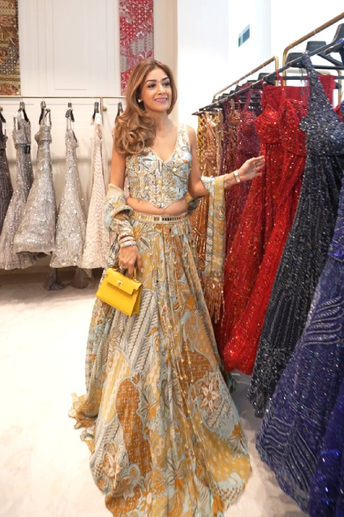 ISHA SAWHNEY IN YELLOW FLORAL CORSET WITH TASSEL LEHENGA & PRINTED DUPATTA SET